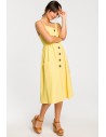 Sukienka na szelkach z guzikami - żółta